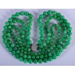 AN 18CT CHINESE WHITE GOLD AND JADEITE NECKLACE. Each strand 54 cm long.