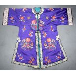 AN EARLY 20TH CENTURY CHINESE SILKWORK EMBROIDERED ROBE Late Qing, decorated with flowers and foliag