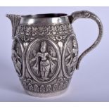 AN ANTIQUE INDIAN SILVER CREAM JUG. 138 grams. 9 cm high.