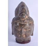 A RARE CHINESE TANG/SONG DYNASTY CARVED STONE HEAD OF A BUDDHIST DEITY elegantly modelled upon a fit