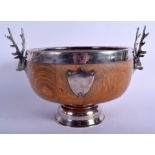AN EDWARDIAN SILVER PLATED OAK MONTEITH TYPE BOWL with plain shield and deer head mounts. 31 cm x 22