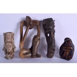 ASSORTED TRIBAL ARTEFACTS in various forms and sizes. Largest 24 cm x 12 cm. (4)