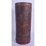 A 19TH CENTURY CHINESE CARVED BAMBOO BITONG BRUSH POT decorated with figures on a buffalo. 26 cm hig