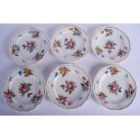 A SET OF SIX EARLY 19TH CENTURY DERBY PORCELAIN PLATES painted with flowers. 21.5 cm wide. (6)