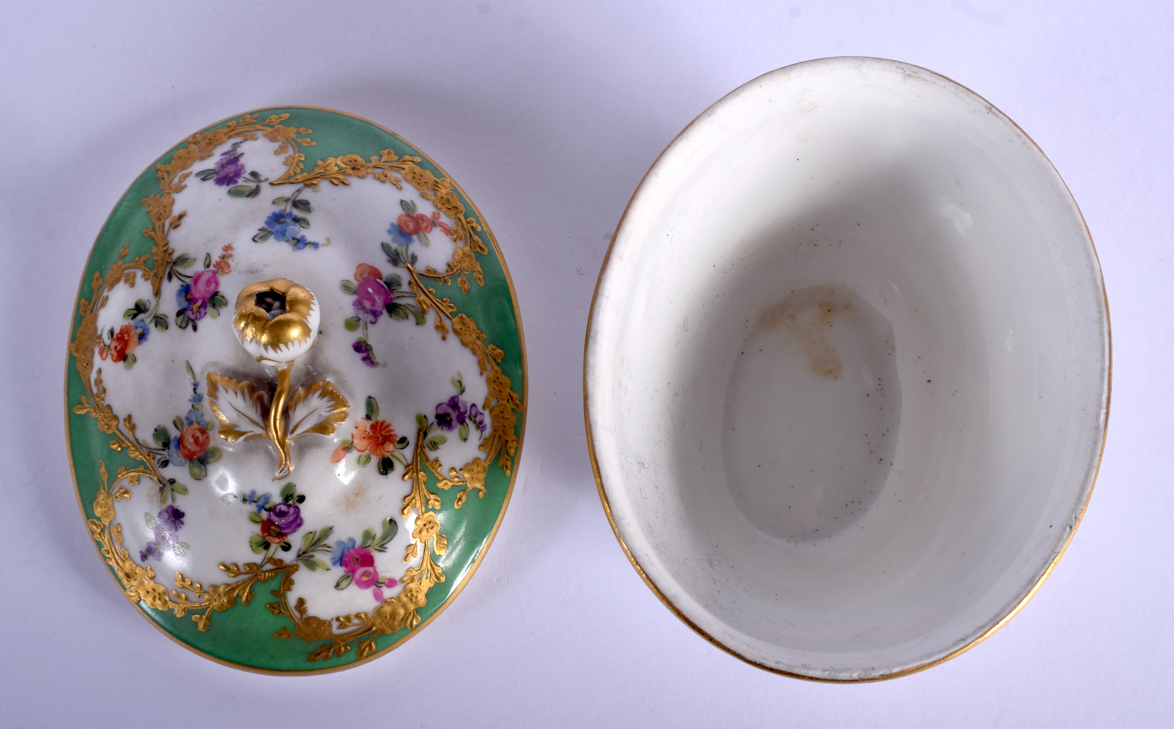 19th c. Paris porcelain oval box and cover painted with flowers in a shape raised gilt panel on an a - Image 3 of 4