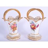 A PAIR OF 19TH CENTURY ENGLISH PORCELAIN BASKET VASES painted with flowers and baskets. 15 cm high.