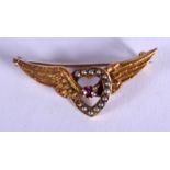 AN ANTIQUE GOLD RUBY AND PEARL SWEETHEART BROOCH. 3.4 grams. 4.25 cm wide.