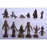 TWELVE 18TH/19TH CENTURY INDIAN HINDU BRONZE FIGURES in various forms and sizes. Largest 9 cm x 3 cm
