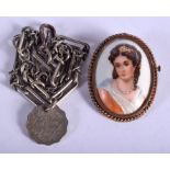 A SILVER BRACELET and brooch. (2)