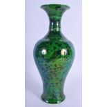 A CHINESE GREEN GLAZED PORCELAIN FISH VASE 20th Century, decorated with reeds and lotus. 30 cm high.