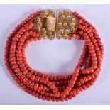 A LARGE 18CT GOLD RED CORAL NECKLACE. 310 grams. 40 cm wide.