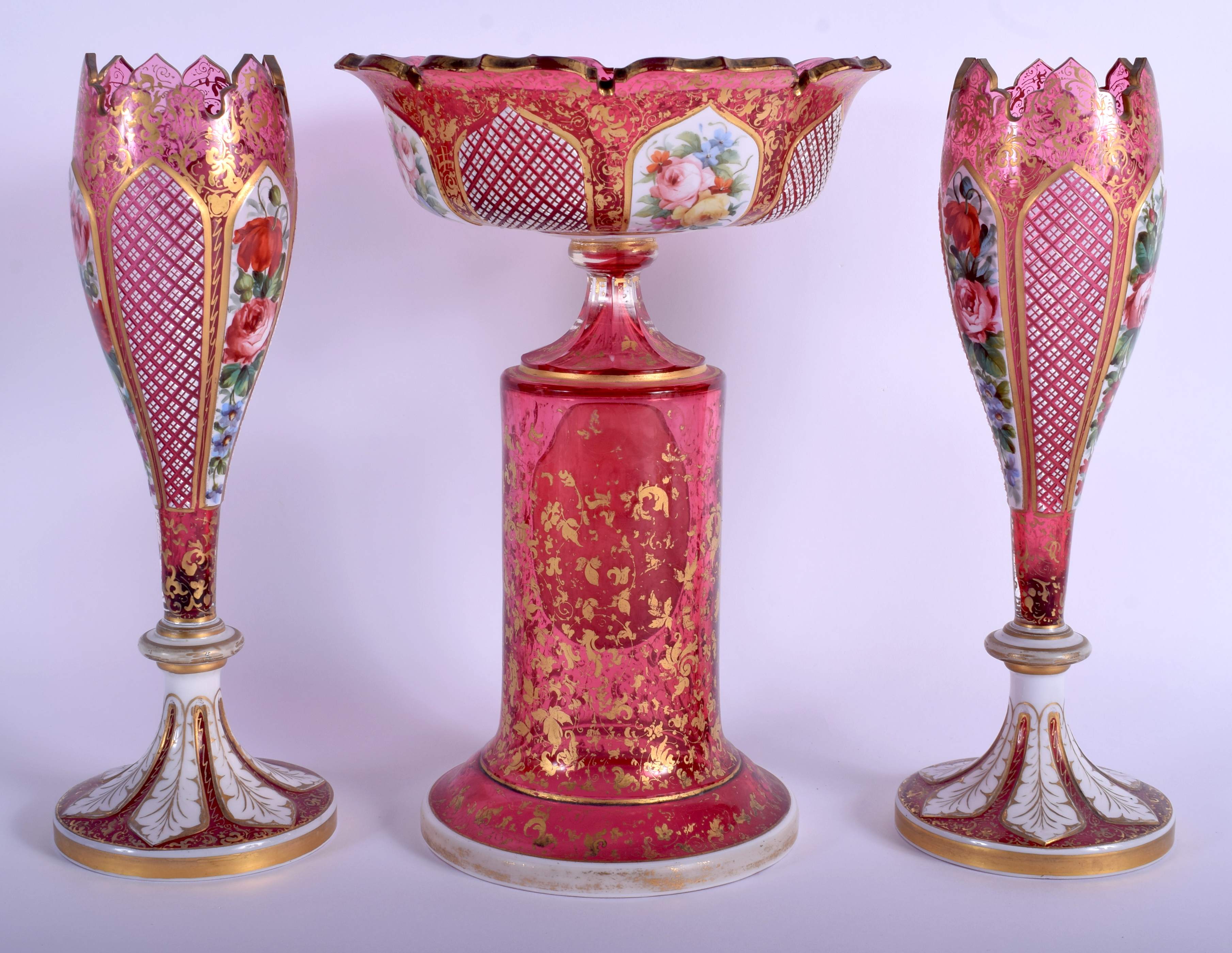 A 19TH CENTURY BOHEMIAN CRANBERRY GLASS GARNITURE enamelled with a portrait of a female, the vases o - Image 2 of 4