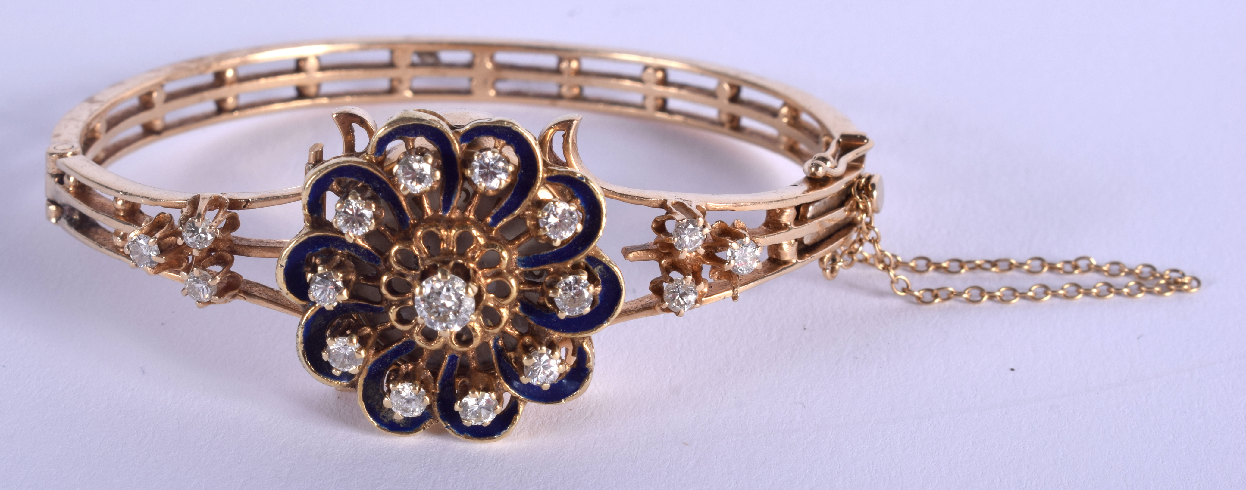 A GOOD 14CT GOLD LUCERNE BANGLE DIAMOND AND SAPPHIRE WRISTWATCH. 27.5 grams. 5.75 cm wide.