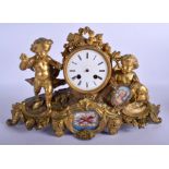 A 19TH FRENCH ORMOLU AND SEVRES PORCELAIN MANTEL CLOCK formed with cherubs amongst foliage. 34 cm x