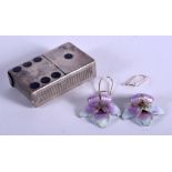 AN ANTIQUE VICTORIAN DOMINO SILVER VESTA CASE Chester 1899, together with a pair of enamel earrings.