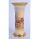 A ROYAL WORCESTER PORCELAIN HIGHLAND COW VASE by Stinton. 12 cm high.