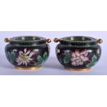 A PAIR OF 1950S CHINESE CLOISONNÉ ENAMEL ASHTRAYS decorated with birds. 8.5 cm wide.
