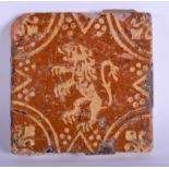 A 16TH/17TH CENTURY EUROPEAN POTTERY SQUARE TILE painted with a stylised lion. 15 cm square