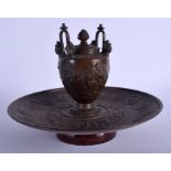 A 19TH CENTURY EUROPEAN BRONZE TWIN HANDLED INKWELL AND COVER decorated with portrait medallions. 21