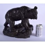 A LARGE 19TH CENTURY FRENCH BRONZE FIGURE OF A ROAMING BEAR modelled roaming upon a naturalistic out