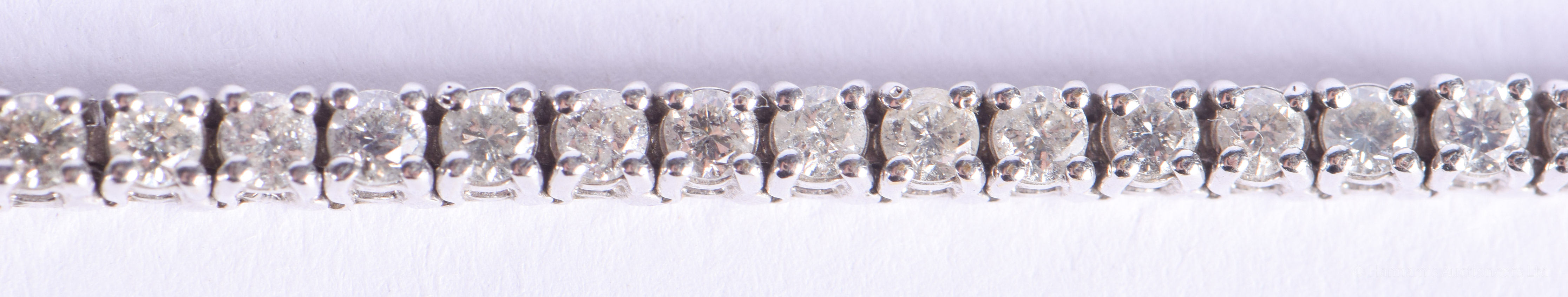 A FINE 18CT GOLD AND DIAMOND TENNIS BRACELET. 15.2 grams. 18 cm x 0.4 cm. - Image 4 of 9