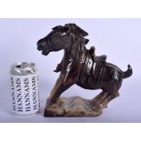 AN EARLY 20TH CHINESE CARVED JADE FIGURE OF A HORSE modelled upon a naturalistic base. 21 cm x 21 cm