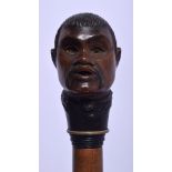 A VERY UNUSUAL 19TH CENTURY CONTINENTAL AUTOMATON WALKING CANE formed as an Oriental male with movin