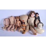 A COLLECTION OF VINTAGE DOLLS including a bisque German example. Largest 62 cm long. (qty)