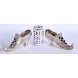 A RARE LARGE PAIR OF 19TH CENTURY CONTINENTAL SILVER SHOES decorated with flowers and scrolling moti