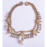 A GOOD 15CT GOLD AND PEARL FLORAL NECKLACE. 20 grams. 41 cm long.