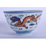 A 19TH CENTURY CHINESE BLUE AND WHITE DOUCAI PORCELAIN BOWL Guangxu mark and period, painted with dr