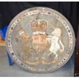 A LARGE CONTINENTAL PRECIOUS STONE INSET TABLE TOP depicting an armorial crest. 112 cm diameter.