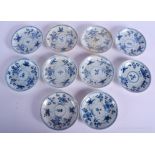 TEN CHINESE CA MAU CARGO PORCELAIN SAUCERS painted with moths. 11.5 cm diameter. (10)