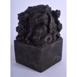 A LARGE CHINESE BRONZE DRAGON SEAL 20th Century. 15 cm x 8 cm.