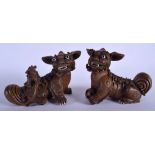A PAIR OF EARLY 20TH CENTURY CHINESE TERRACOTTA YIXING BUDDHISTIC DOGS Late Qing. 19 cm x 14 cm.