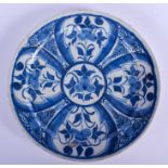 AN 18TH CENTURY DELFT BLUE AND WHITE POTTERY DISH painted with flowers. 23 cm diameter.
