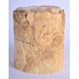 A 19TH CENTURY JAPANESE MEIJI PERIOD CARVED IVORY TUSK VASE AND COVER decorated with monkeys and ele