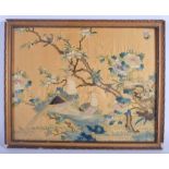 A 19TH CENTURY CHINESE CANTON SILKWORK EMBROIDERED BIRD PANEL Qing, decorated with birds within land