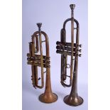 TWO VINTAGE TRUMPETS Vincent Bach Corp. 44 cm x 15 cm. (2)