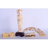 A 19TH CENTURY CHINESE CARVED IVORY FIGURE together with Qing rings etc. (5)
