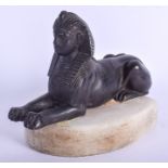 A 19TH CENTURY FRENCH EGYPTIAN REVIVAL BRONZE SPHINX upon a stone base. Bronze 15 cm wide.