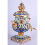 A CONTINENTAL SILVER AND ENAMEL SAMOVAR painted with flowers. 156 grams. 12 cm x 6 cm.