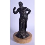 AN 18TH/19TH CENTURY EUROPEAN BRONZE FIGURE OF A STANDING GOD modelled with one hand raised upon a m