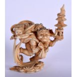 A 19TH CENTURY JAPANESE MEIJI PERIOD CARVED IVORY OKIMONO modelled as oni holding aloft a temple. 7