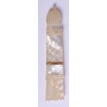 A 19TH CENTURY PALAIS ROYALE TYPE MOTHER OF PEARL NEEDLE CASE. 8 cm long.