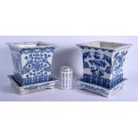 A LARGE PAIR OF 19TH CENTURY CHINESE BLUE AND WHITE PLANTERS Qing, upon fitted stands. 24 cm x 19 cm