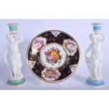 A PAIR OF 19TH CENTURY EUROPEAN PORCELAIN CANDLESTICKS together with a Derby or Coalport stand, mode