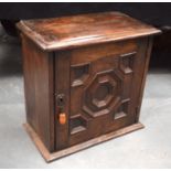 A 17TH/18TH CENTURY OAK KITCHEN CUPBOARD with geometric decoration. 40 cm x 42.5 cm.