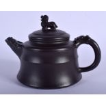 A CHINESE YIXING POTTERY TEAPOT AND COVER 20th Century, with Buddhistic lion terminal. 16 cm wide.