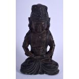 A CHINESE BRONZE FIGURE OF A SEATED BUDDHISTIC DEITY 20th Century, modelled holding a teapot. 19 cm